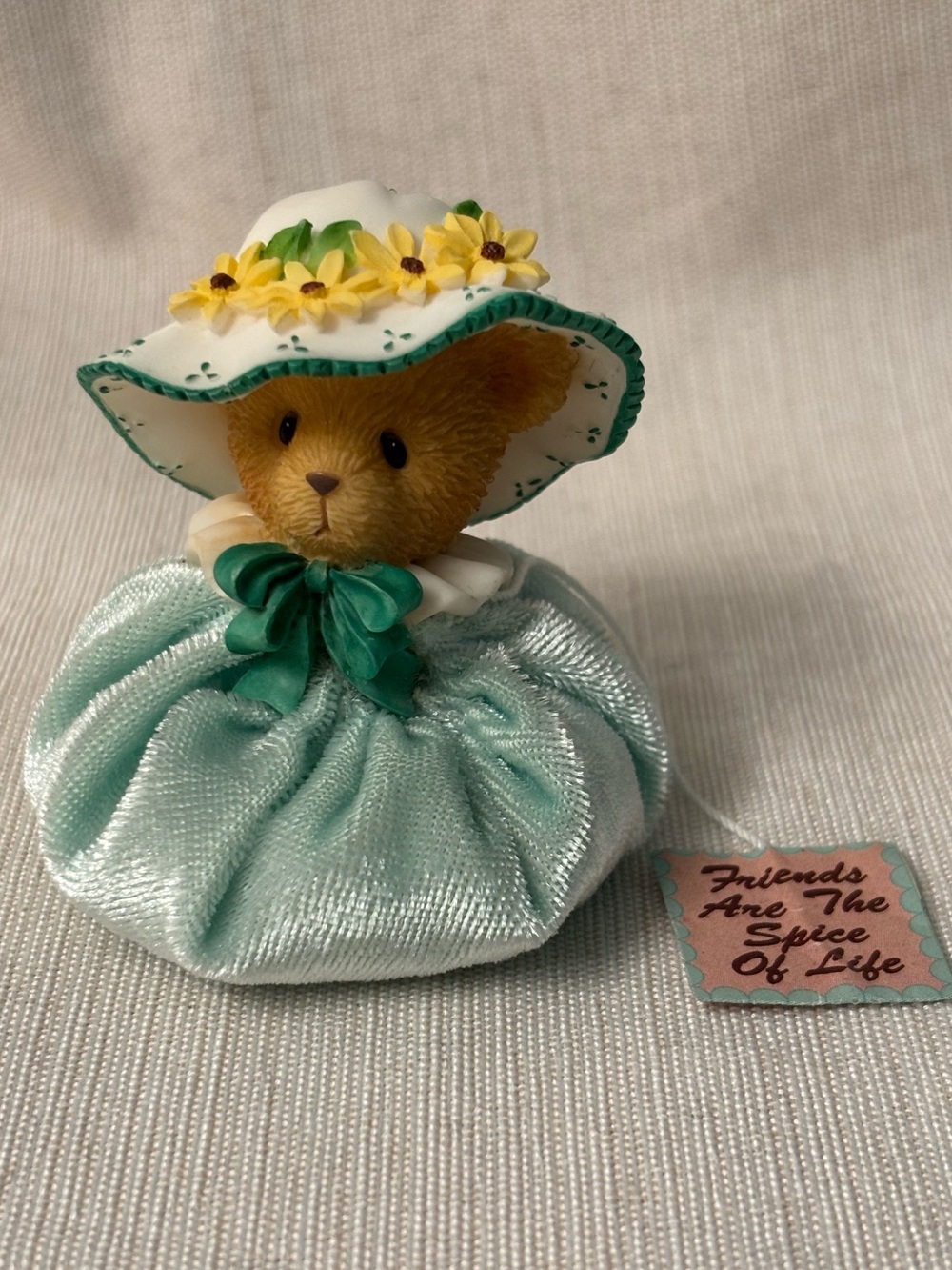 Miniature bean bag with figurine bear head with Yellow Flower Hat